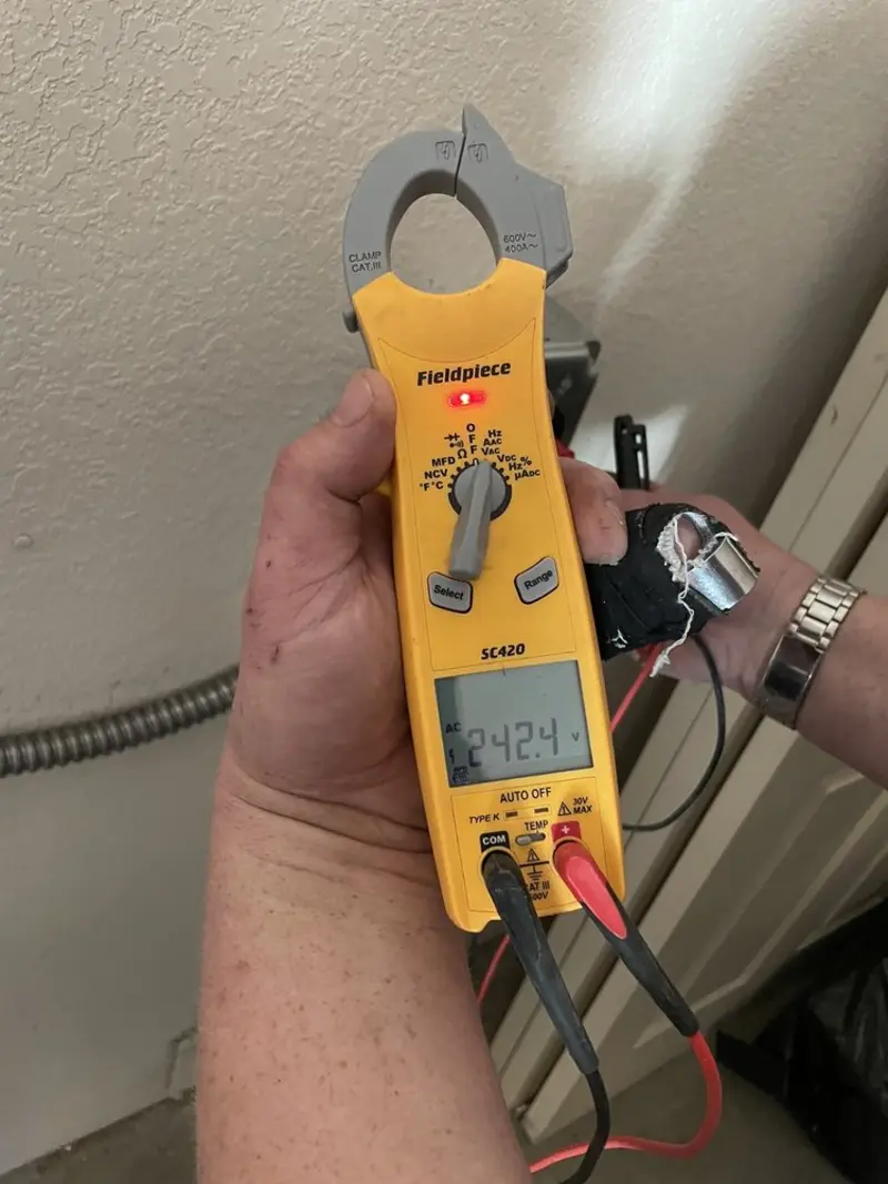 Voltage testing with clamp meter during Aluminum Wiring Replacement in Brookmont